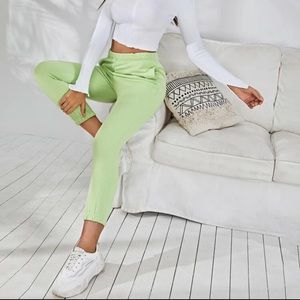 Mint green sweat pants.